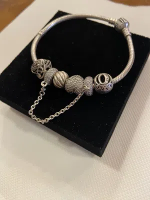 Pandora Bracelet with 6 charms  اسوارة باندورا مع ستة تشارمز