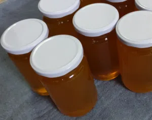 عسل نحل طبيعي مكفول