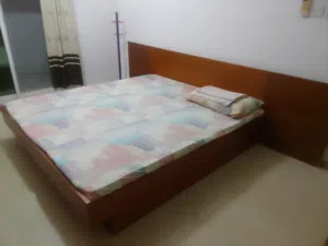 Double bed,dressing table nd double door cupboard.