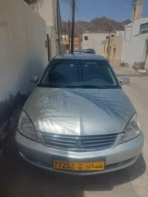 سيارة ميتسوبيشي لانسر بحالة ممتازة Lancer net and clean
