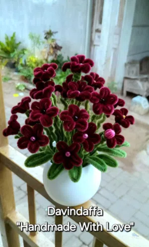 باقات ورد مصنوعه يدويا من خيوط الصوف حسب الطلب الالوان والاشكال والاسعار حرق