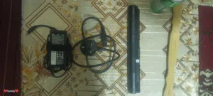 شاحن ديل وبطارية مستعمل بحالة جيده