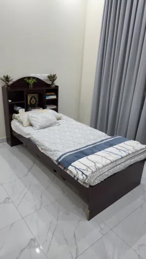 Single bed with rack