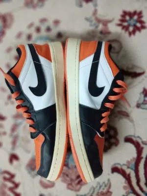Nike air Jordan (black and orange mixed colors) size 43