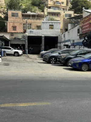 محطة غسيل سيارات وغيار زيت وبناشر للبيع في العبدلي