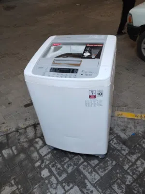 LG washing machine fully automatic 13kg good condition and working properly good with warranty with