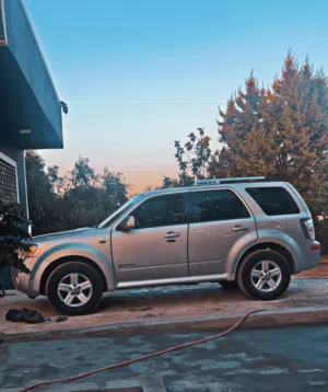 اقبل بدل سياره كهربائيه للبيع Mercury Mariner Hybrid 2008فل كامل + فتحة سقفلون فضي — محرك 2.3 Hybrid