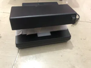MONEY DETECTOR Designed for most banknotes, cheques and bank drafts, credit.etc