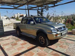 ميستوبيشي L200 2006 دفع رباعي للبيع او البدل على سيارة كهرباء او هجين