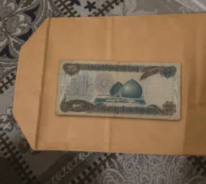 عمله 25 دينار صدامي محتفظ بيها من 1980 رقم مميز جدا ونادر .للبيع .