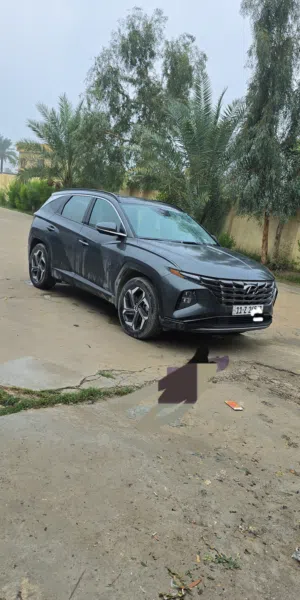 توسان هايبرد 23