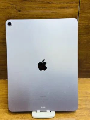 iPad Air M2 13 inch 128 GB battery health 97% one month shop warranty.