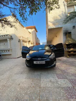 هيونداي اكسنت 2014 موديل أسود فاخرة مرخصة مع مواصفات تقنية حديثة ومتطورة