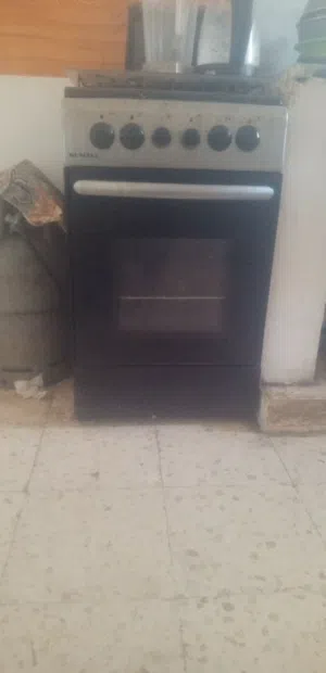فرن غاز 4 عيون مع جره غاز