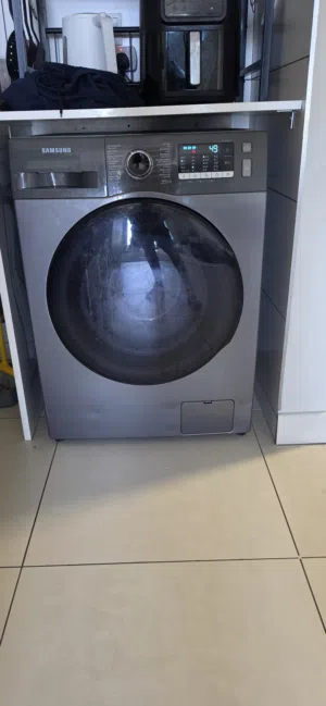 A Samsung washing machine with dryer غسالة سامسونج بمجفف