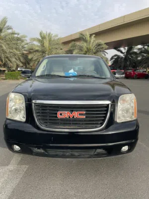 Family used GMC Yukon 2009 with black color for sale.