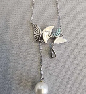 Sterling Silver butterfly necklace with a pearl