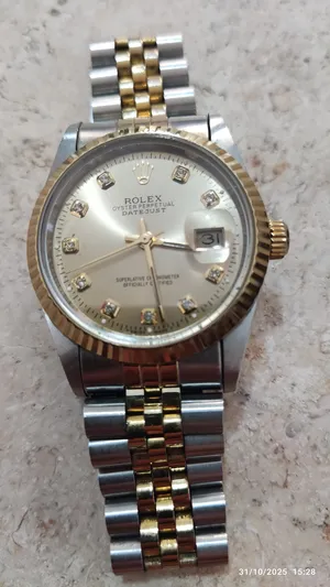 ساعه روليكس اوتوماتيك ودقيقه جدا بالوقت صناعه السويسري 100% نص ذهب مألمسه شهري بحاله الجديد