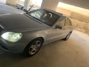 مرسيدس غواصة موديل 2005  للبدل على قطعة ارض أو مزرعة أو شقة