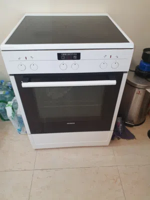 أدوات منزلية براد وفرن طباخ و غسالة مع نشافة