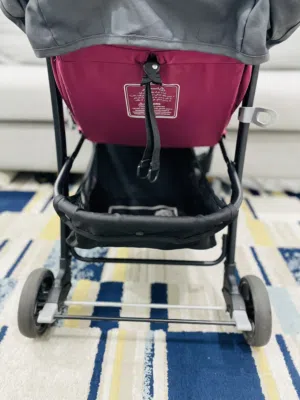 Almost New Stroller with Large Rubber Wheels by Junior Brand عربة جديدة تقريبا ماركة جونيور