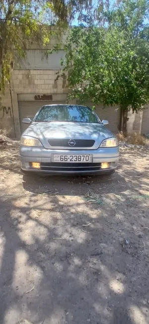 اوبل استرا اوتوماتيك 2001 فحص كامل 7جيد من المالك بحالة الشركة صيانة الشركة اقتصادية جدا اطارات جديد
