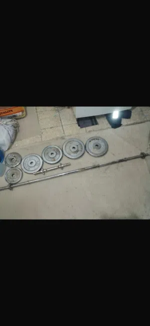 للبيع دمبل و بار استعمال نظيف بحاله جيده جدا