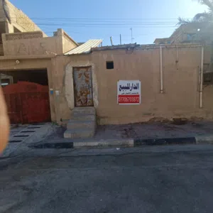 عقار بيت في الجنينه قرب شارع التجاري بيت مساحته 240 متر  طابقين