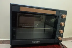Click On brand oven in excellent condition, 60-liter size, used for a short period.