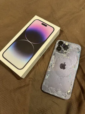 iPhone 14 Pro Max 256GB Purple Battery 89% الزجاجة الخلفية مكسورة وما بدي اصلحو عشان ما ينفتح