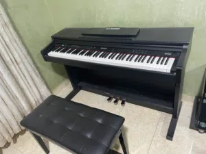 LAGRIMA digital piano 88 keys with piano bench (used)  بيانو مع كرسي بيانو مستعمل