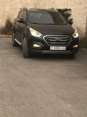 توسان 2015  ترخيص وتامين شامل طويل  بصمة دخول  بصمة تشغيل  حساسات خلفية  كميرا خلفية اصلية