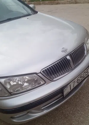 نيسان صني 2003 موديل، لون فضي، بحالة ممتازة، مرخصة، أوتوماتيك، تأمين إلزامي