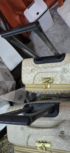 ‏أخرى ‏.‏ شنط سفر ‏.‏ ذهبي‏1