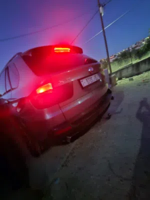 بي ام ×5 لون رمادي في ضربه خفيفه فلدعميه الاماميه