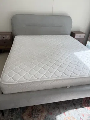 King size bed with mattress and two night stands