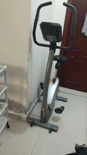 Three in one offer, exercise bicycle, moving chair, medium tv cabniet