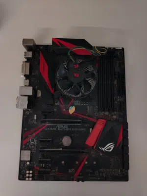 مذر بورد b250h gaming strix من Asus بورد بحالة ممتازة جداً + معالج i7 7700 راكب عالبورد و المبرد