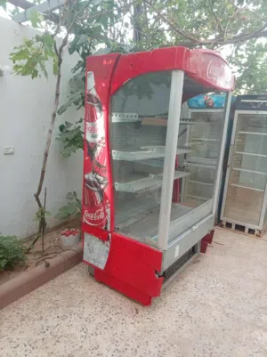 تلاجة عرض كولا