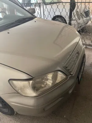 ميتسوبيشي لانسر 2002 سيارة صالون بحالة جيدة مع مواصفات خليجية