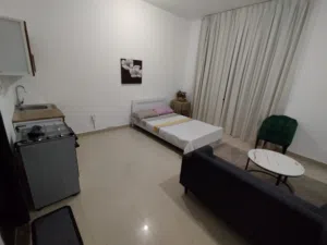 FUENISHED STUDIO IN KHALIFA CITY A FIOR RENT AND READY TO MOVE IN