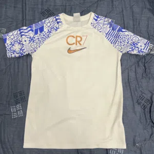 White Nike shirt cr7 for sports. High quality authentic Nike. Medium and very good price.