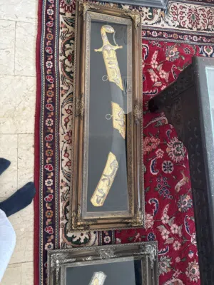 Old Kuwaiti sword in a picture frame