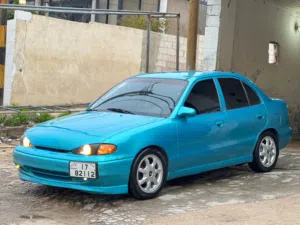 سيارة هيونداي اكسنت موديل 1994 لون فيروزي