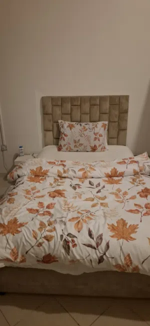 beige bed frame