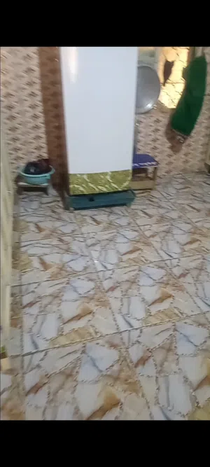 بيت في الزبير حي الشهداء الشارع العريض قريب حسن قدح طابو صرف مساحه البناء 200متر