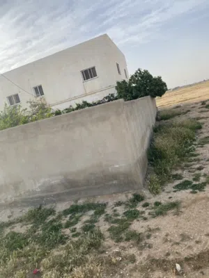 بيت طابقين ع دلمين ارض للبيع