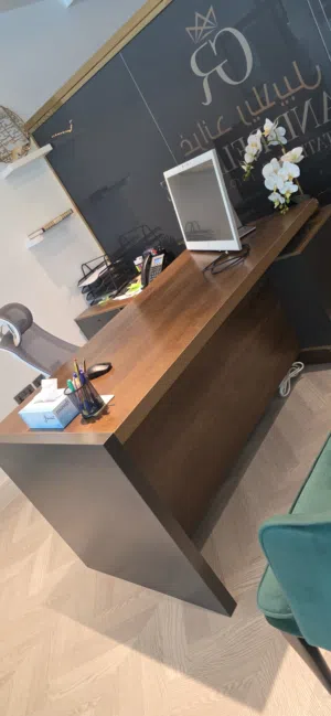 office desk with power sockets and chair