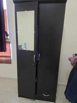 Cot with mattress and double door cupboard