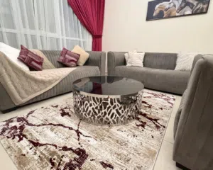 Special 1BHK apartment with balcony and two bathrooms located in Al Taawun area offering comfortable